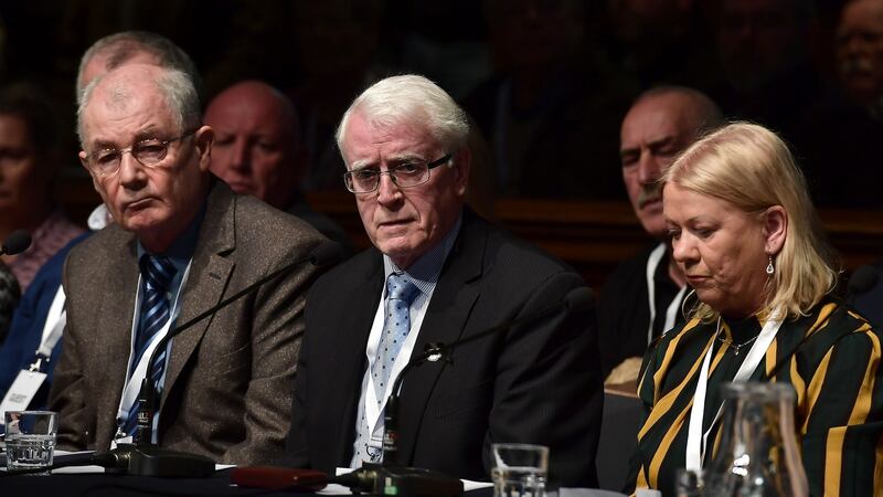 John Kelly (C), whose brother Michael died during Bloody Sunday, during a press conference in reaction to the Bloody Sunday prosecution announcement. Photo by Charles McQuillan/Getty