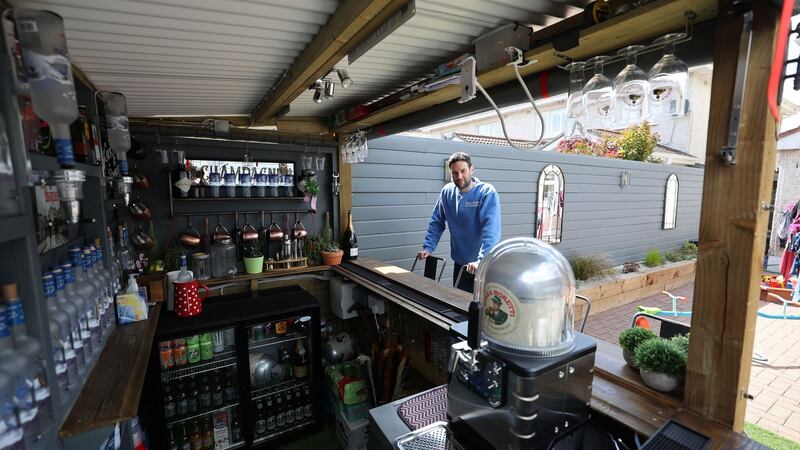 Darragh McGrane in his back garden bar ‘McGrane’s Club Tropicana’. Photograph: Nick Bradshaw