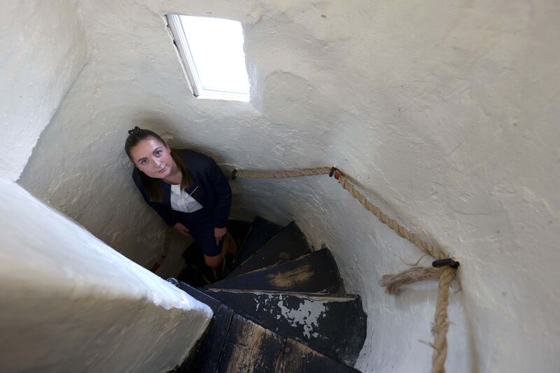 Samantha James on the staircase that leads to the room. Photograph: Stephen Davison