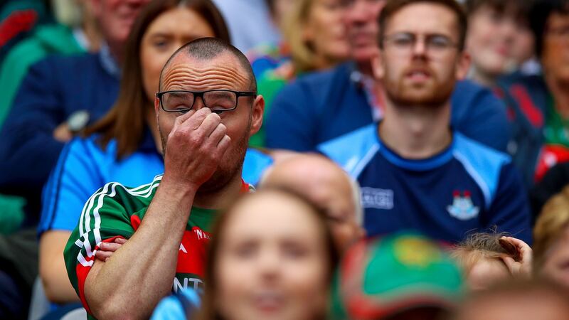 A dejected Mayo fan at last Saturday’s All-Ireland SFC semi-final at  Croke Park. Photograph: Tommy Dickson/Inpho