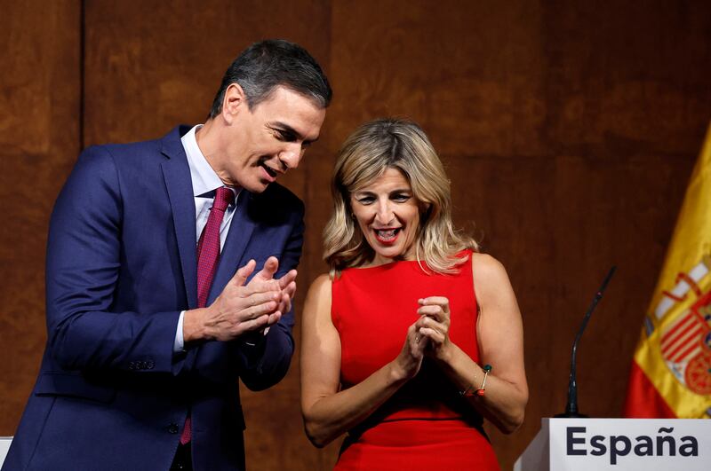 Spain's acting prime minister and Socialist Party leader Pedro Sánchez, and the acting labour minister Yolanda Díaz, leader of the left-wing Sumar alliance, applaud after signing an agreement this week to form a coalition government. Photograph: Oscar Del Pozo/AFP via Getty Images