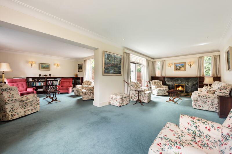 Two of the larger reception rooms flow into each other