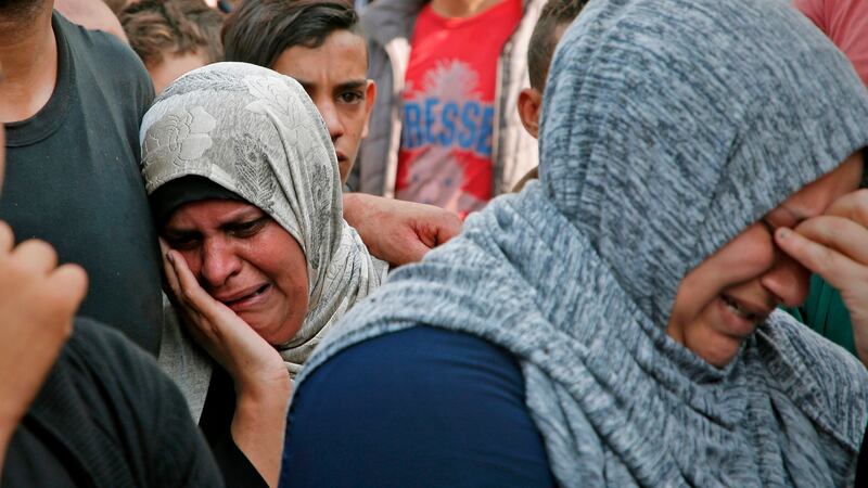 Palestinian women mourn outside the mortuary of Gaza City’s Al-Shifa hospital on November 13th after two more Palestinians were killed  in an Israeli strike, according to Gaza’s health ministry. Photograph: Anas Baba/AFP via Getty