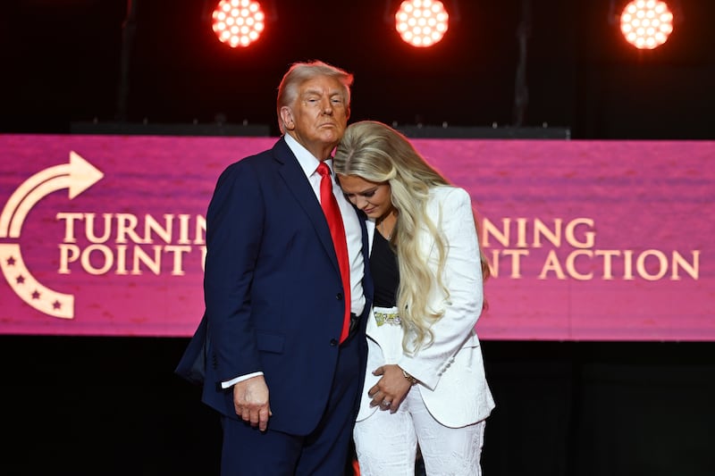 President Donald Trump with Erika Kirk, widow of Charlie Kirk, during the memorial for her late husband at State Farm Stadium in Glendale, Arizona. Photograph: Kenny Holston/The New York Times
                      