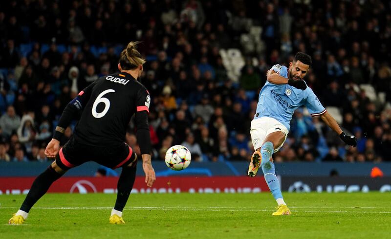 Riyad Mahrez scores City's third goal of the game against Sevilla. Photograph: PA