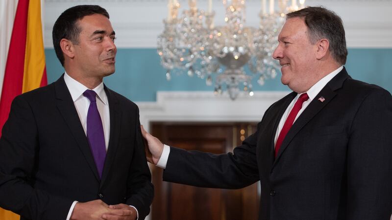 US secretary of state Mike Pompeo greets Macedonian minister for  foreign affairs Nikola Dimitrov (L)  in Washington, DC, in August. Photograph: Saul Loeb/AFP/Getty Images