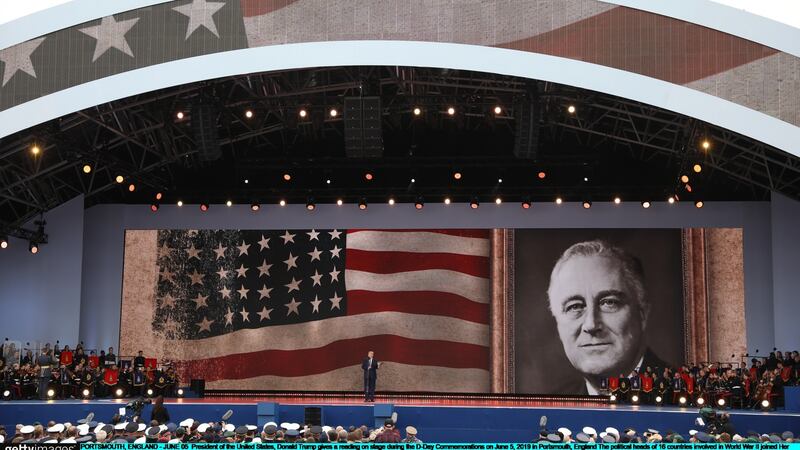 US president  Donald Trump gives a reading on stage during  D-Day commemorations in Portsmouth, England. Photograph: Dan Kitwood/Getty Images