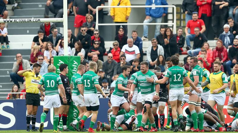 Newcastle celebrate their opening try against Toulon. Photograph: James Crombie/Inpho