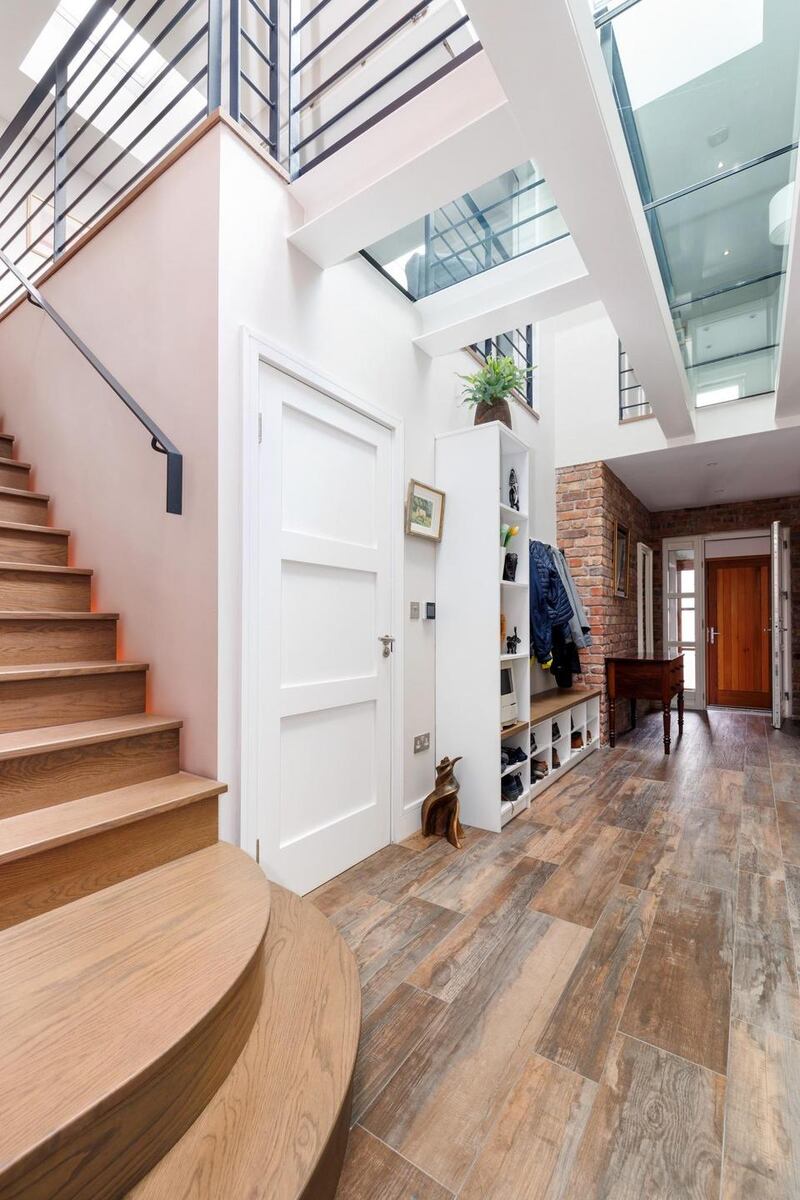 Hall with toughened glass gantry overhead