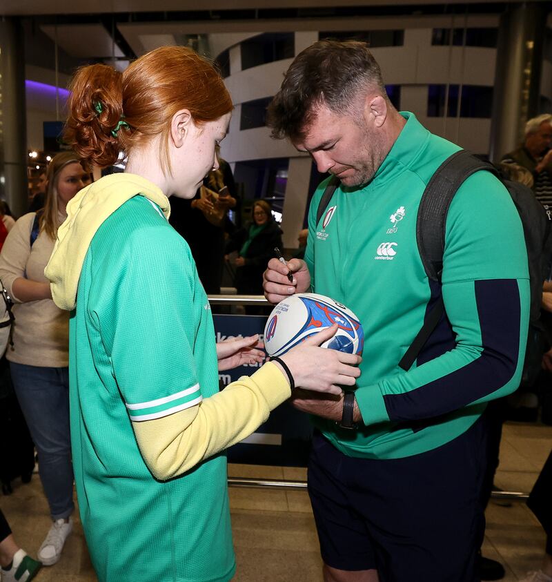 Ireland’s Peter O’Mahony signs an autographs for a fan. Photograph:  INPHO/Ben Brady