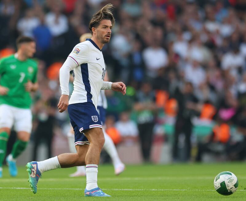 England's Jack Grealish passes the ball during the game against Ireland. Photograph: James Crombie/Inpho