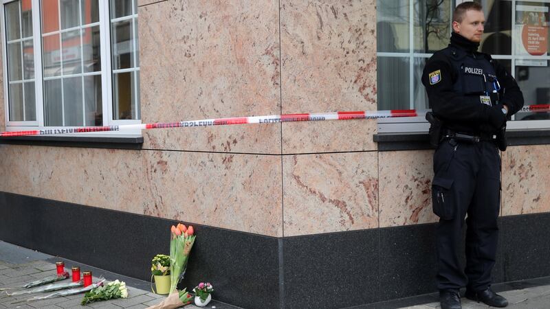 Flowers placed where police guards stands after  shootings in Hanau, Germany. Photograph: Armando Babani/EPA