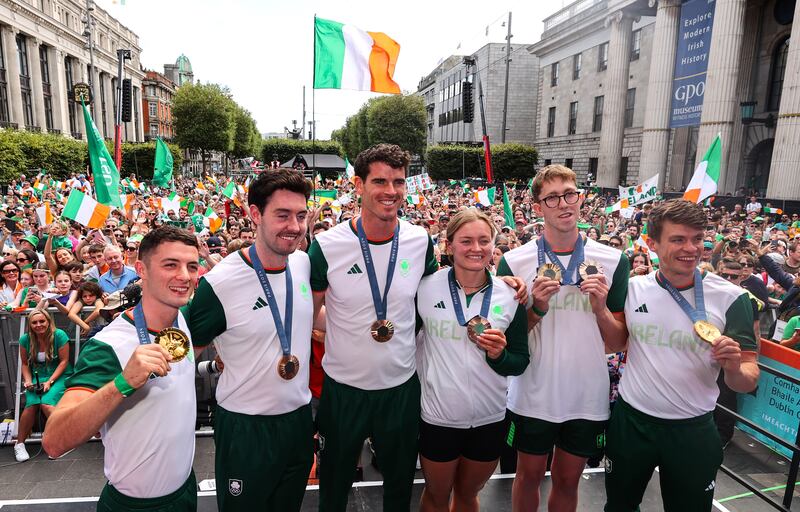 Rhys McClenaghan, Daire Lynch, Philip Doyle, Mona McSharry, Daniel Wiffen and Fintan McCarthy pose with their medals. Photograph: 
INPHO/Ben Brady