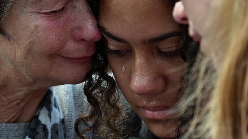 Residents cry after leaving flowers in tribute to victims in Christchurch, on March 17th, 2019, two days after a shooting incident at two mosques in the city. Photograph: Anthony Wallace/AFP/Getty Images