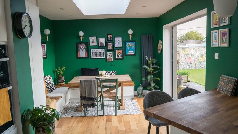 Karen Cafferky and Joe Hurl say they   couldn’t afford to build-on, so their architect designed a plan using the existing kitchen and turning the workshop extension into a dining room. Photograph: Keith Heneghan