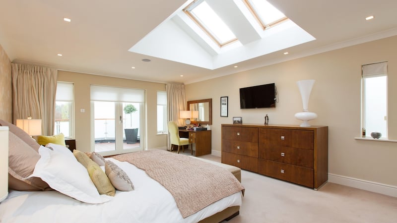 Upstairs, five bedrooms – all doubles – open off a wide landing where there’s space for a large desk; the owners use it as a study