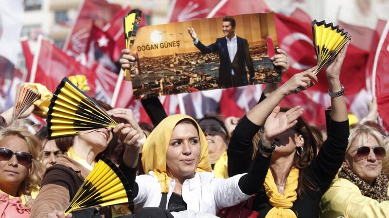 Supporters of Turkey’s main opposition Republican People’s Party (CHP) wave party flags during an election rally in Istanbul yesterday. Photograph: Osman Orsal/Reuters.
