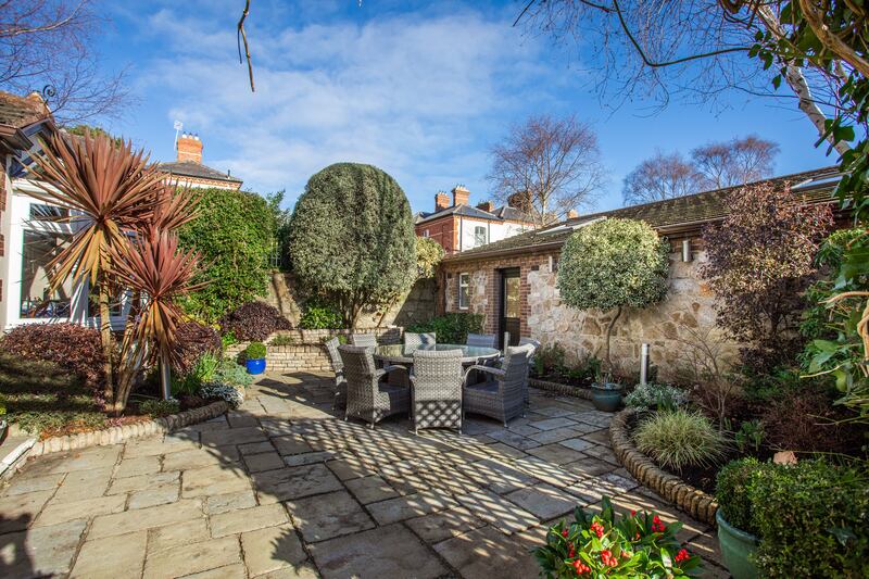 The walled back garden is all patio and relatively small given the size of the house.