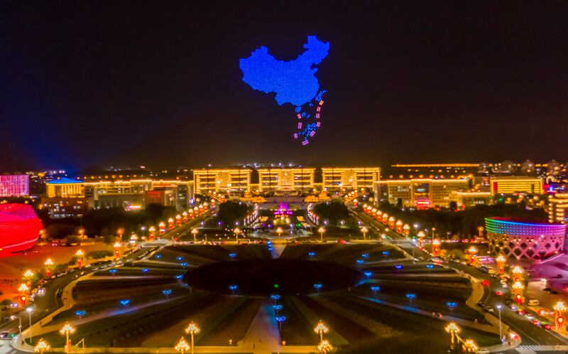 A cluster of drones performs a light show above a civic square to welcome National Day in Ordos on Sept 30th, 2022. Photograph: CFOTO/Future Publishing via Getty Images