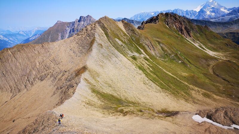 Richard Nunan’s team running the ridge off “le Chantoin” Mont Blanc Massif during the PTL race in 2018.