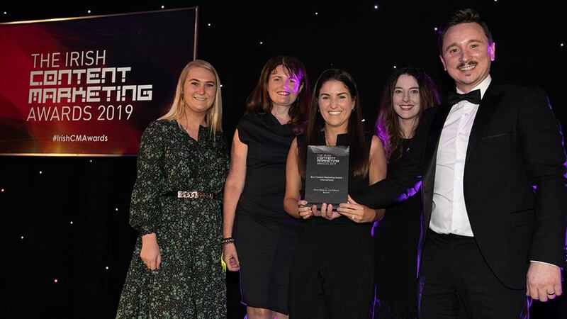 Barry Walsh, Awards Judge presents the Best Content Marketing Award - International to Core & Lily O’Brien’s Teams.