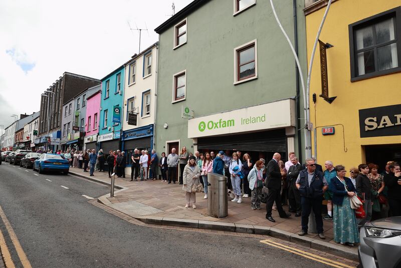 Members of the public join families of some of those bereaved to mark the anniversary. Photograph: Liam McBurney/PA Wire