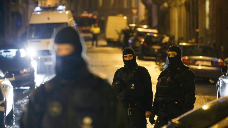 Police block the street of Colline in Verviers, in Belgium. The victims are reported to be individuals who were under surveillance after returning from Syria. Photograph: Olivier Hoslet/EPA