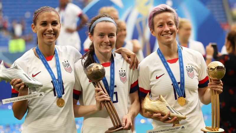 Alex Morgan, Rose Lavelle and Megan Rapinoe celebrate after the USA’s World Cup victory. Photograph: Denis Balibouse/Reuters