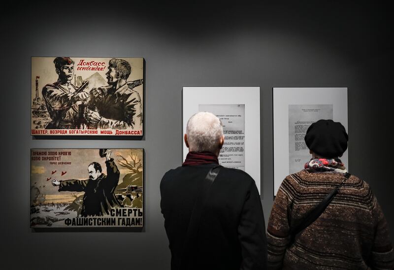 People visit an exhibition at the Manege Central Exhibition Hall in Moscow on Russia's 'special military operation' in Ukraine. Photograph: Yuri Kochetkov/EPA-DFE