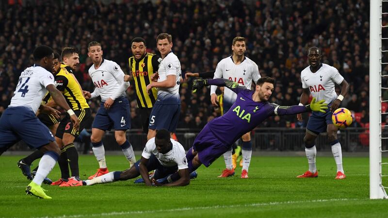 Craig Cathcart of Watford (third from left) scores his team’s first goal past Tottenham Hotspur goalkeeper Hugo Lloris  during the Premier League match  at Wembley Stadium. Photograph: Mike Hewitt/Getty Images