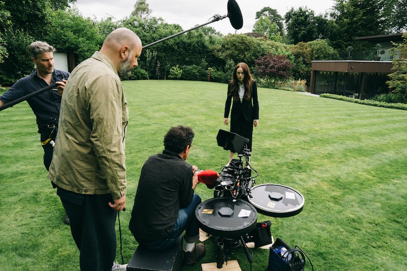 Director Yorgos Lanthimos, director of photography Robbie Ryan and Emma Stone on the set of Bugonia. Photograph: Atsushi Nishijima/Focus Features