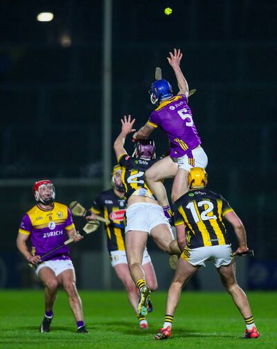 Wexford’s Charlie McGuckin climbs for a ball against Kilkenny’s Eoghan Lyng. Photograph: Ken Sutton/Inpho