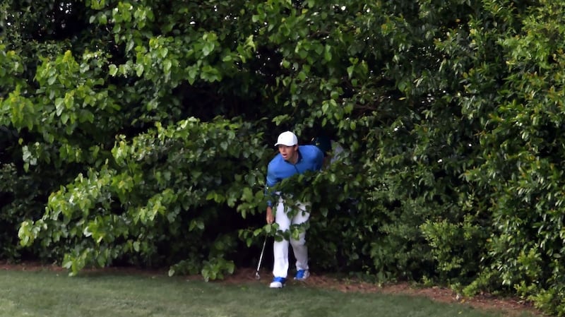 Northern Ireland’s Rory McIlroy comes out of the woods after playing a shot on the 4th hole during   the final round. Photo: Getty Images