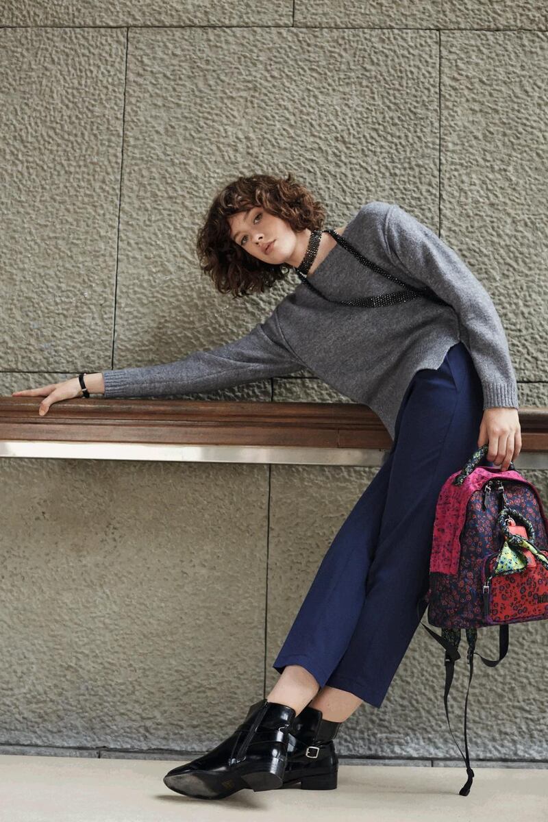 Necklace €14.99, sweater €34.99, backpack €44.99, boots €44.99