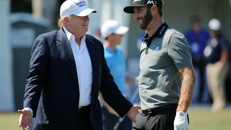 Donald Trump and Dustin Johnson pictured together in 2016. Photograph: Mike Ehrmann/Getty