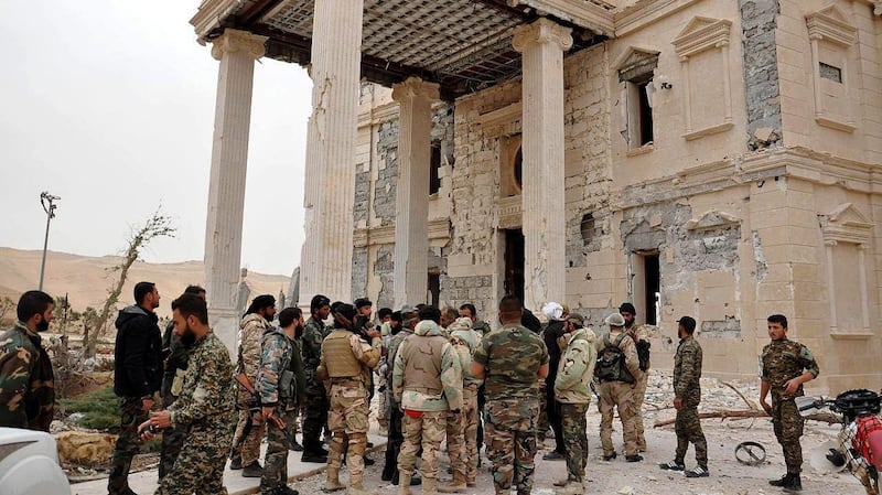 Syrian army units, in co-operation with local militias, advancing  into Palmyra. Photograph: EPA/Sana/handout