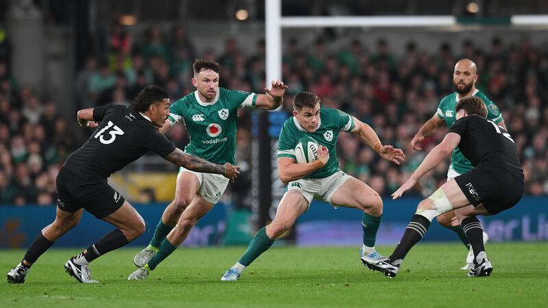 Ireland's Garry Ringrose gets between Rieko Ioane and Jordie Barrett of New Zealand. Photograph: Charles McQuillan/Getty Images