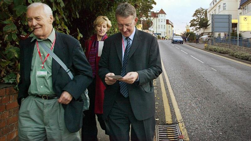 Tony Benn with his children Melissa and Hilary in 2003. Photograph: AFP