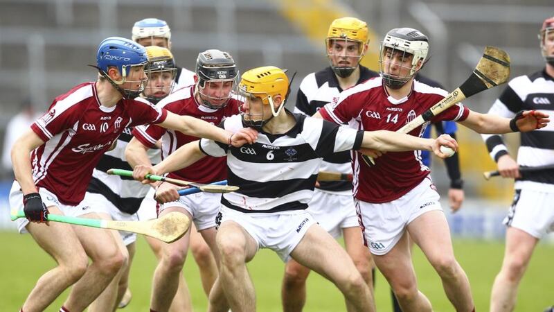 St. Kieran’s Jesse Roberts is surrounded by Presentation College Athenry’s players at Semple Stadium. Photograph: Ken Sutton/Inpho