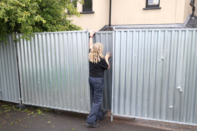Garda outside the house in Clondalkin on Thursday morning. Photograph: Collins