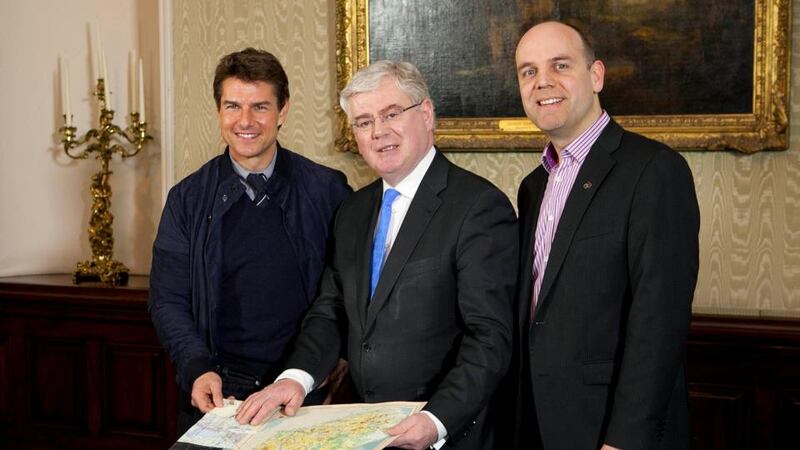 Tom Cruise with Tanaiste and Minister for Foreign Affairs Eamon Gilmore and Mark Henry of Tourism Ireland at the Department of Foreign Affairs in Dublin. Photograph:Shane O'Neill/Fennells/PA Wire