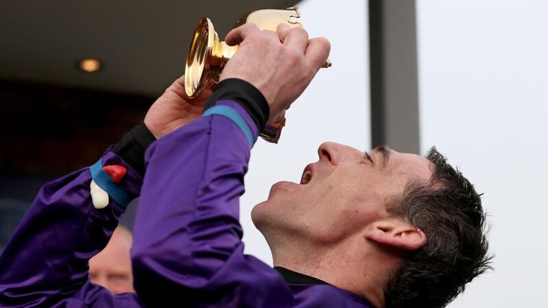 The Betfred Cheltenham Gold Cup: Davy Russell celebrates winning on  Lord Windermere at Prestbury Park.  Photograph: Dan Sheridan / Inpho