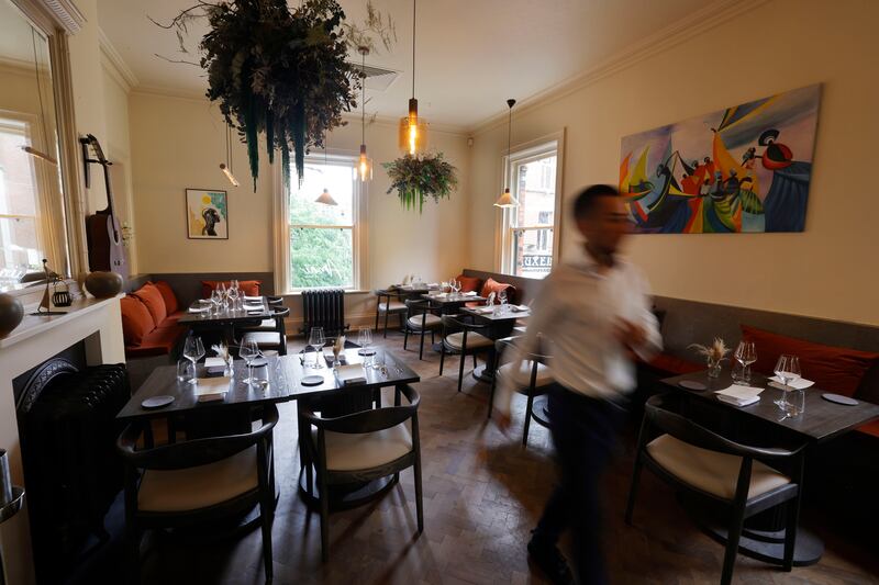 Amai by Viktor: Light floods into the high-ceilinged room through large sash windows