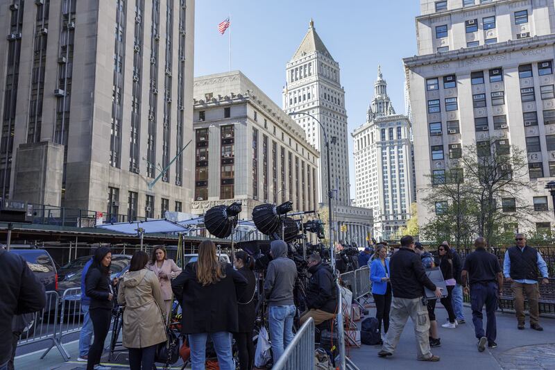 Journalists and production crews works outside the court in New York on Tuesday. Photograph: Sarah Yenesel/EPA
