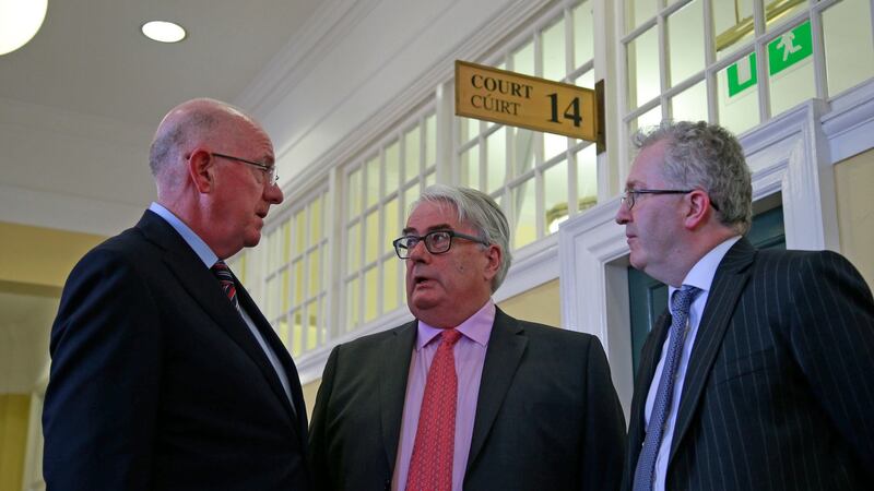 At the Four Courts building in Dublin for a speech by new Chief Justice Frank Clarke (centre),  who  announced a pilot scheme that would see large amounts of the work of the Supreme Court taking place online,  were Minister for Justice Charles Flanagan (left) and  Attorney General Seamus Woulfe SC, September 26th, 2017. Photograph: Nick Bradshaw