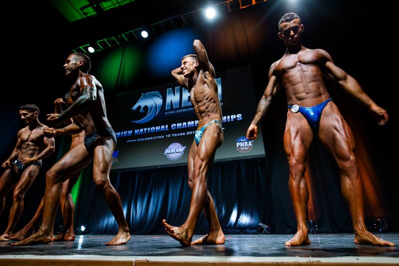 Novice Men Bodybuilding competitors posing for the judges. Photograph: Tom Honan