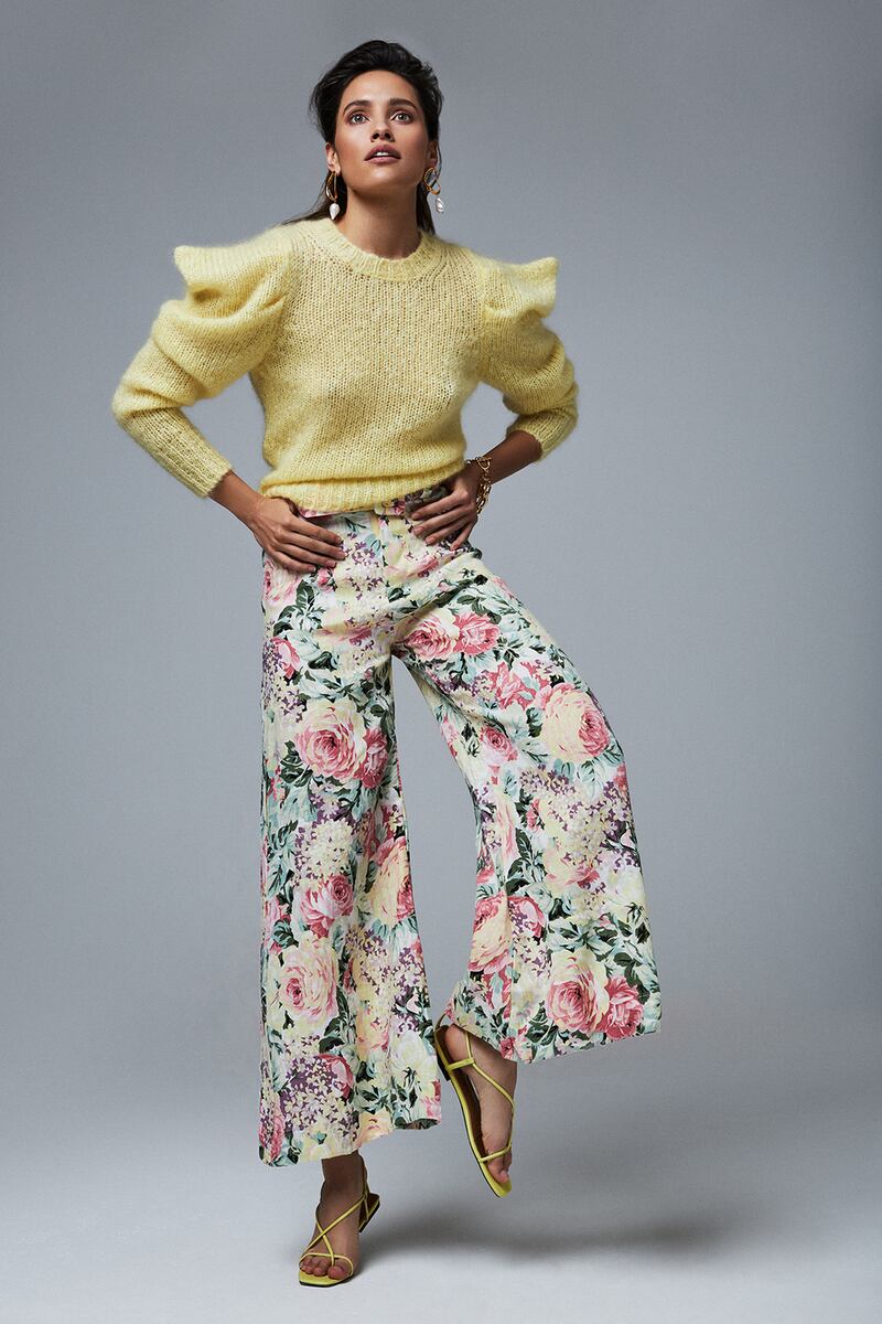 How to wear colour: Yellow knit €550 Isabel Marant, floral linen trousers €230 Faithful the Brand, pearl drop earrings €485 Alighieri, chain bracelet €95 Kenneth Jay Lane, yellow strappy sandals €105 Who What Wear