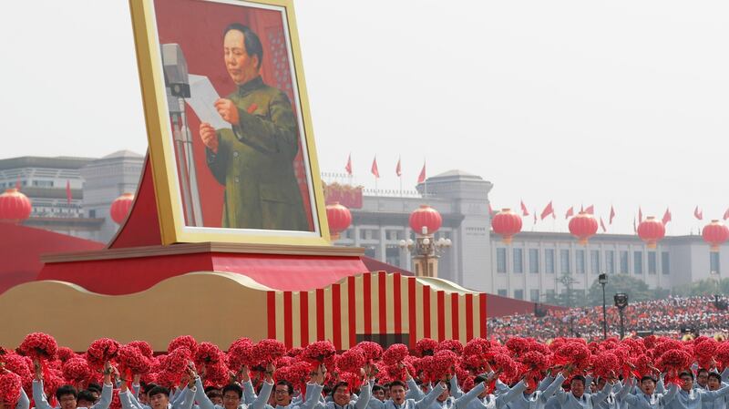 A float carrying a portrait of late Chinese leader and founder of the People’s Republic of China, chairman Mao Zedong, moves past Tiananmen Square during the military parade marking the 70th anniversary of the founding of the People’s Republic of China. Photograph: Wu Hong/EPA