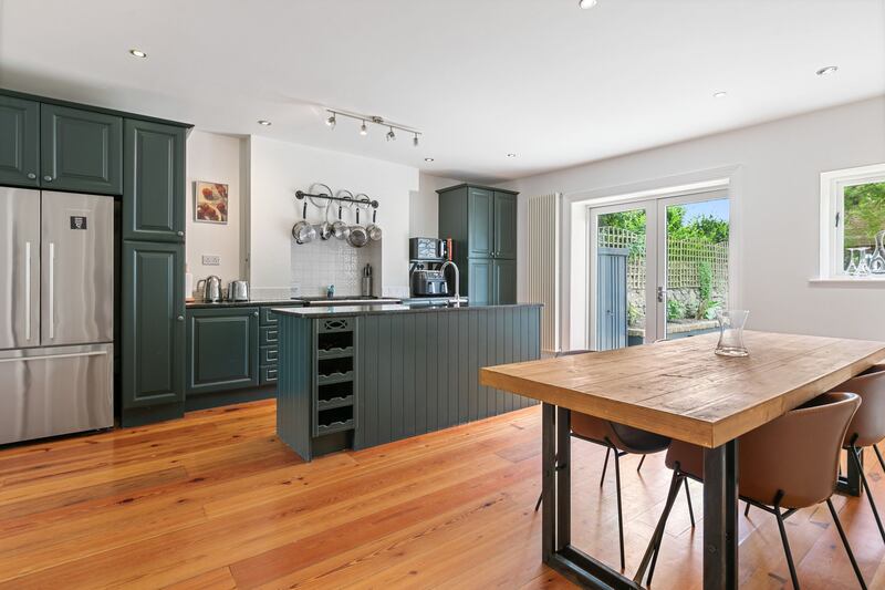 Kitchen with doors to garden