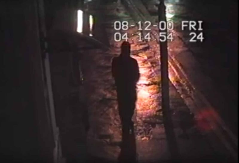 A CCTV image of a man who was seen walking behind Trevor Deely on the night Deely went missing in December 2000.